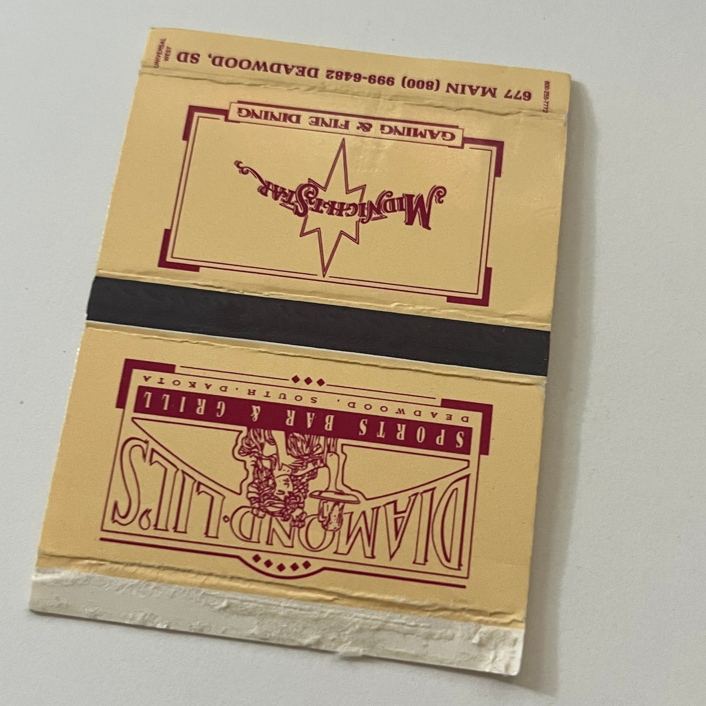 Diamond Lil's Sports Bar & Grill Deadwood SD Vintage Matchbook Cover MM5-7