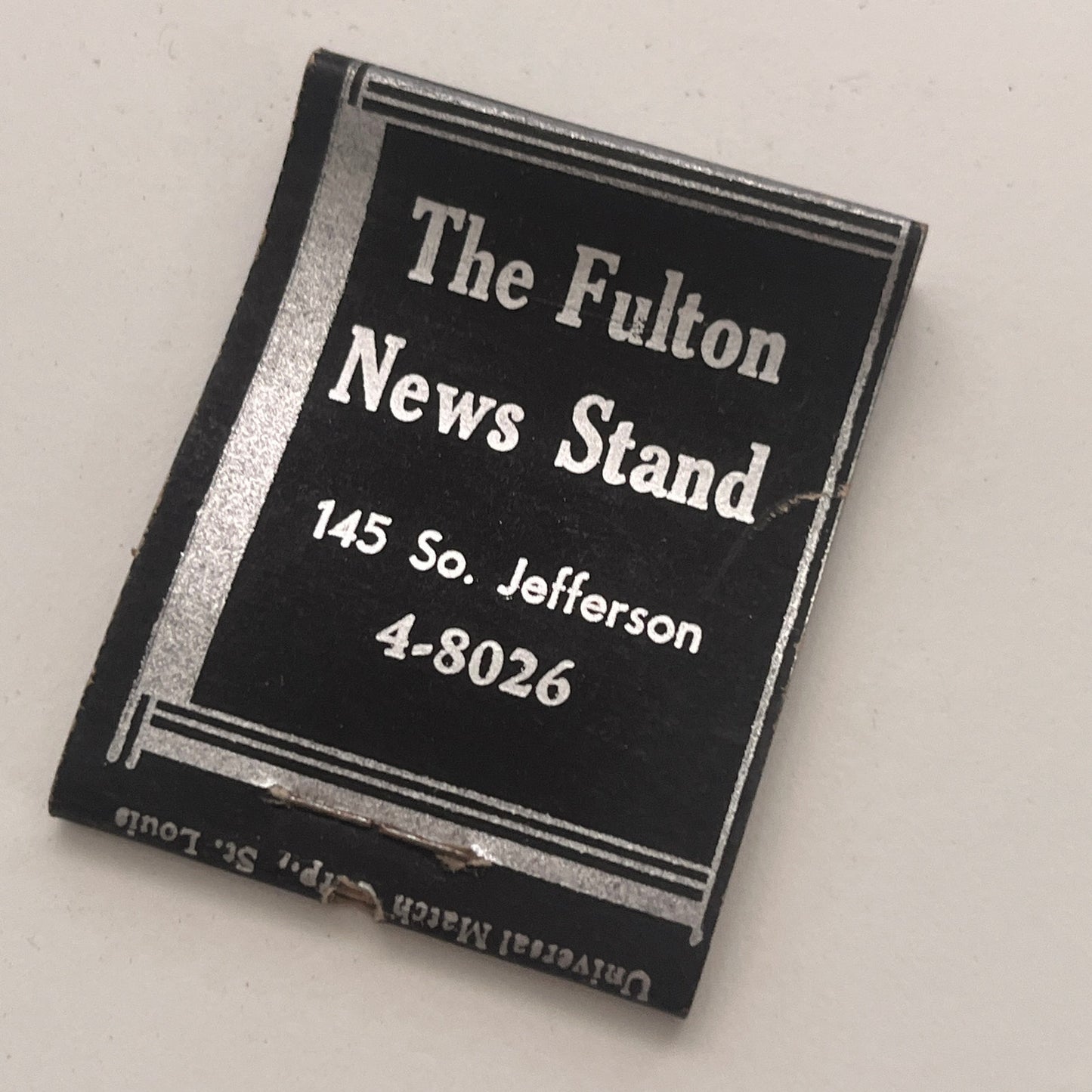 The Fulton News Stand 145 So Jefferson St Peoria IL Matchbook Cover TB8-MB2-7