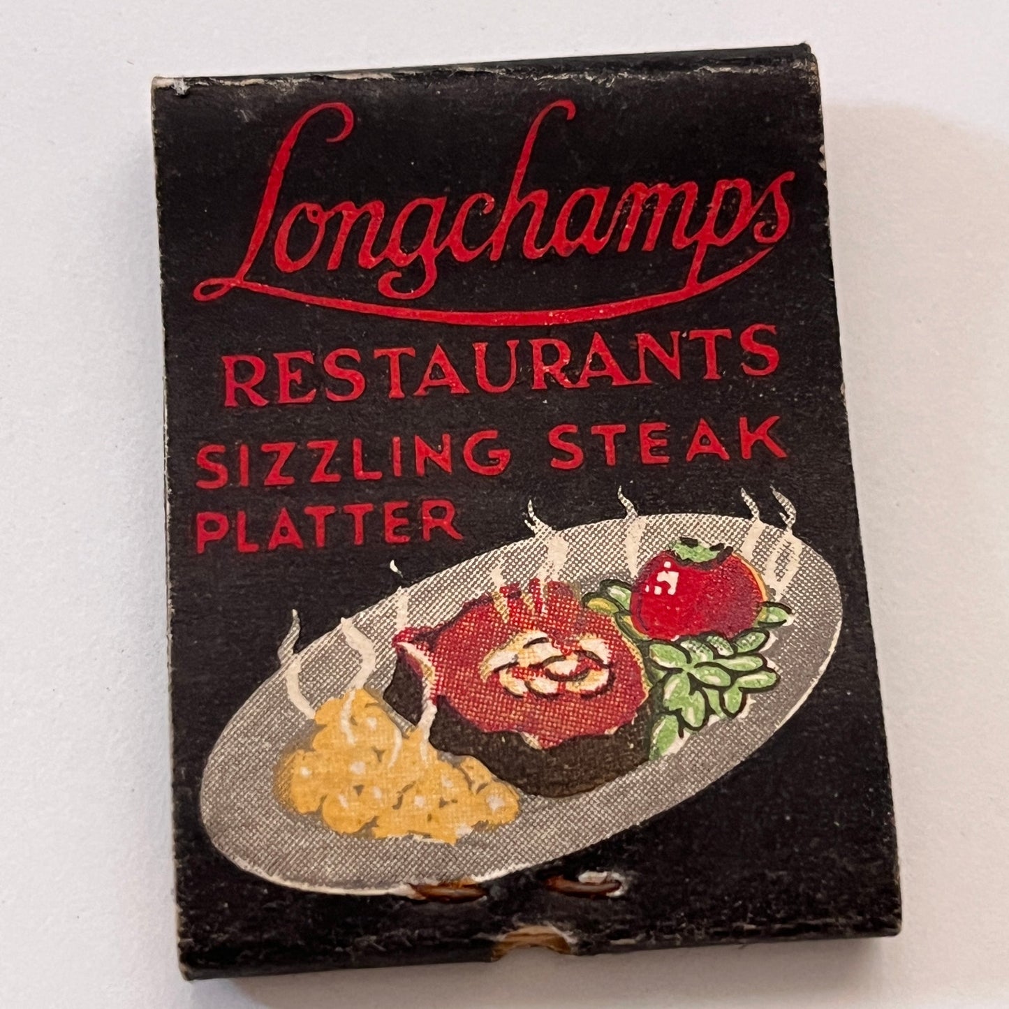 Longchamps Restaurants Sizzling Steak Platter Vintage Matchbook Cover TB8-MB3-10