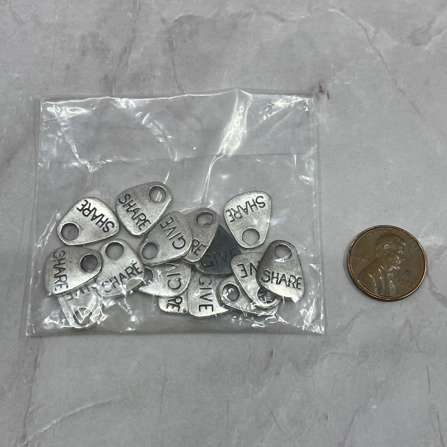 Lot of Metal Share/Give Charms Triangular SB7