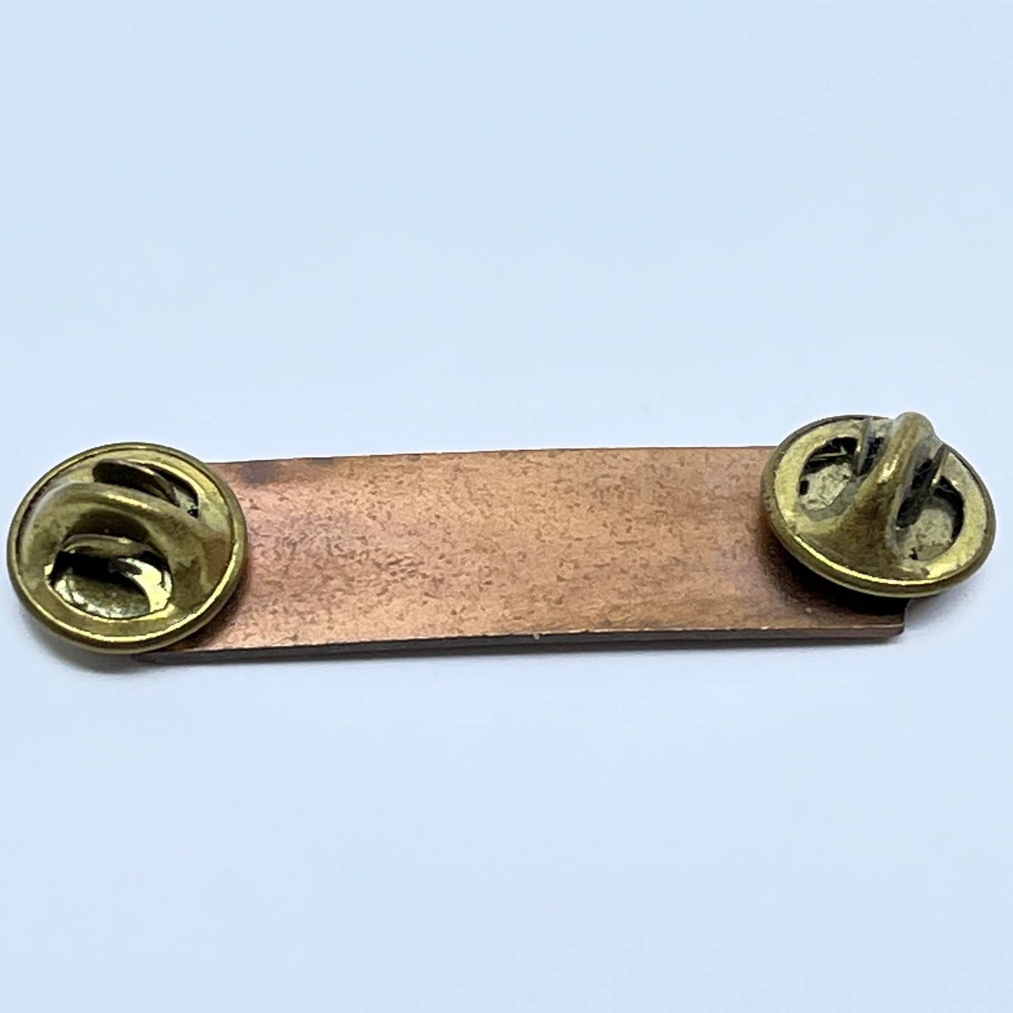 Vintage Copper Tone Pistol Master Bullseye Pinback Button SD8