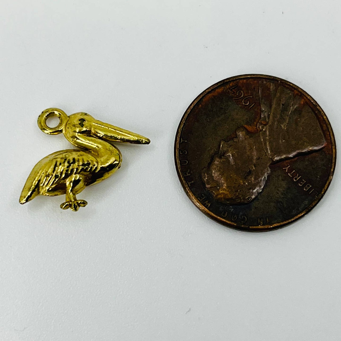 Vintage Gold Tone Celluloid Stork Bird Charm SB3