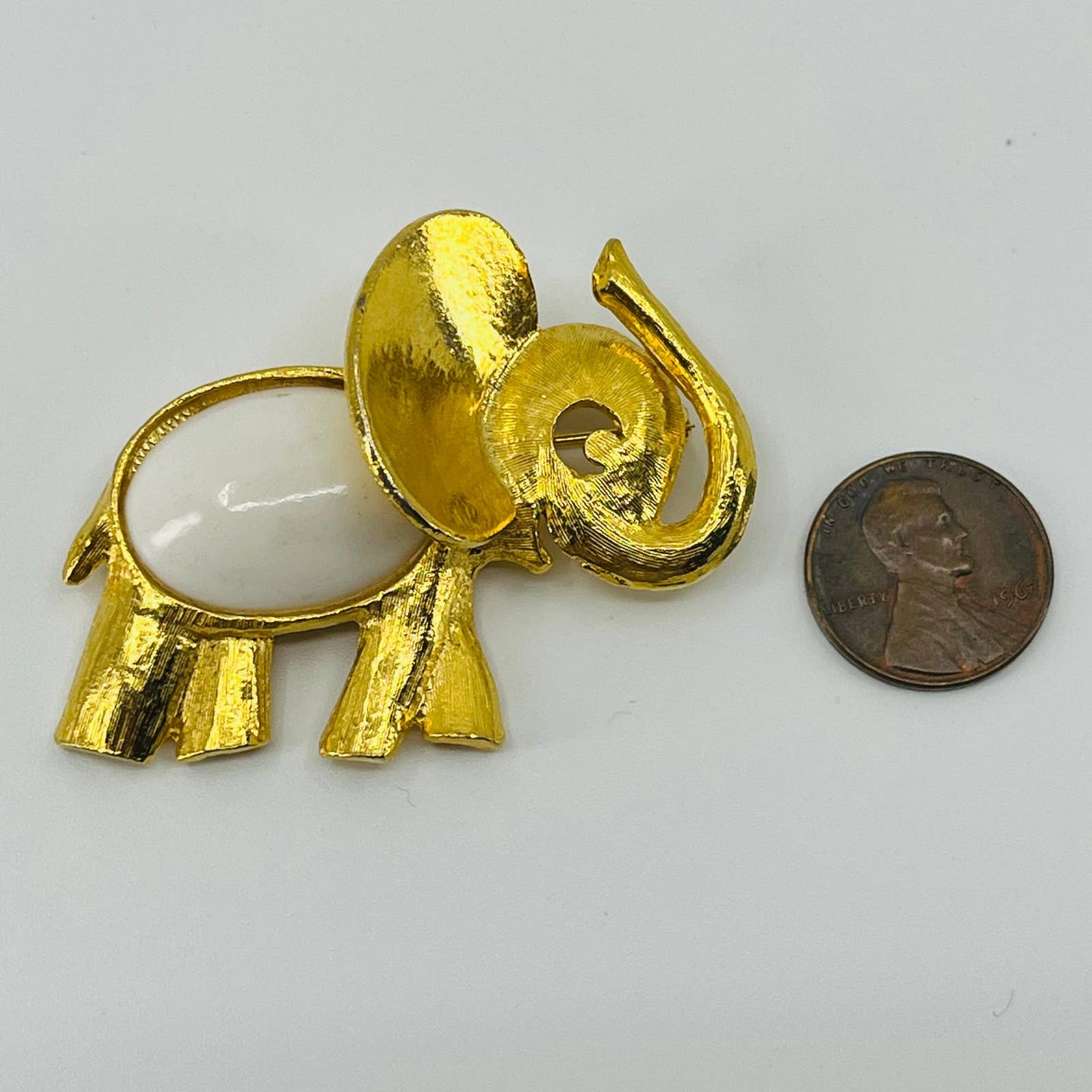 Vintage MCM Elephant Brooch Gold Tone White Enamel SA6