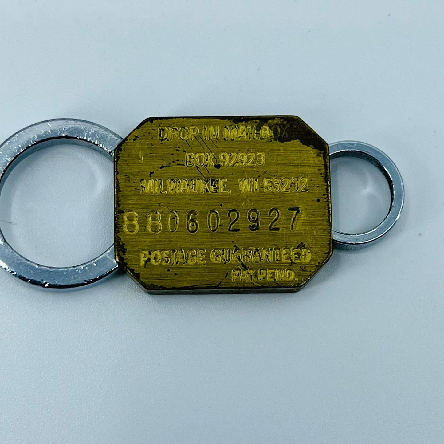 OLDSMOBILE KEYCHAIN FOB DROP IN MAILBOX POSTAGE GUARANTEED MILWAUKEE WI SB3