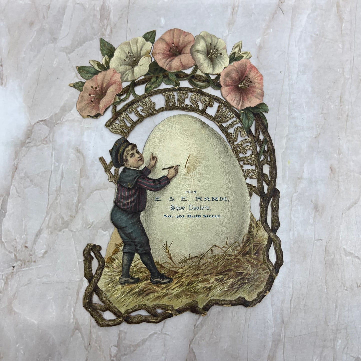 E&E Rahm Shoe Dealers Easter Boy Giant Egg c1880 DieCut Victorian Trade Card AE4