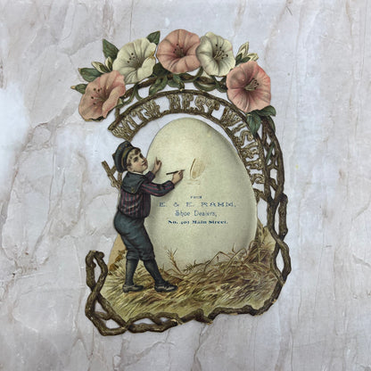 E&E Rahm Shoe Dealers Easter Boy Giant Egg c1880 DieCut Victorian Trade Card AE4