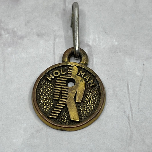 Vintage Hol Man Holman Charm Brass Tone Metal SC1