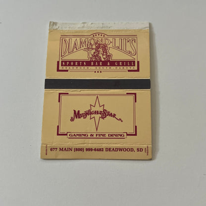 Diamond Lil's Sports Bar & Grill Deadwood SD Vintage Matchbook Cover TB6-MB2-6