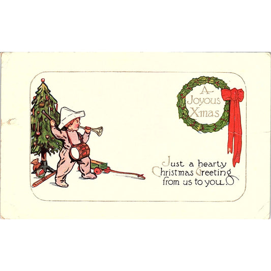1922 Joyous Christmas Little Boy in Paper Hat Embossed Antique Postcard PE1