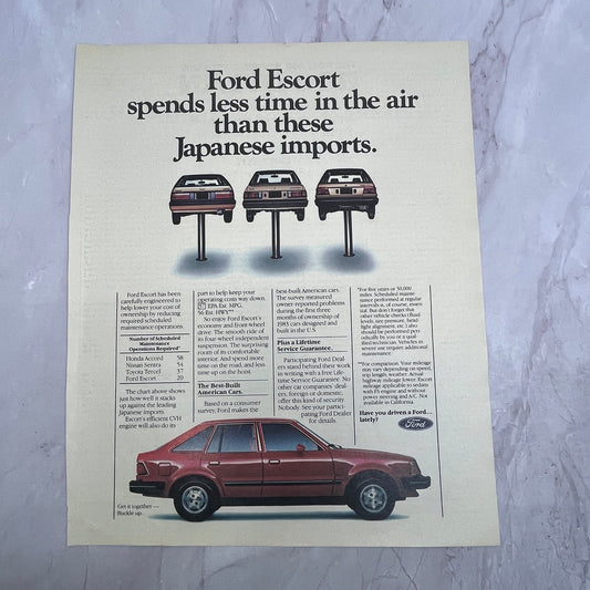 Ford Escort - Less Time in the Air than Japanese Imports 1984 Ad V14-7