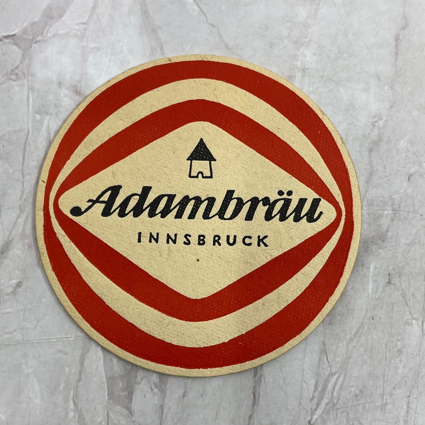 Vintage Adambräu Innsbruck German Beer Coaster Braun Razor Reverse TJ5-CO1