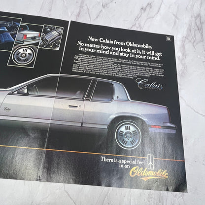 Oldsmobile Calais PC 2 Page Ad 1984 Ad AF8-6