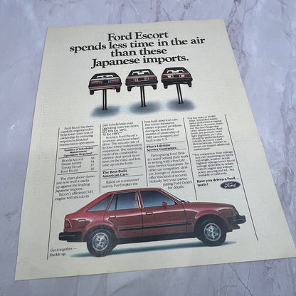 Ford Escort - Less Time in the Air than Japanese Imports 1984 Ad V14-7