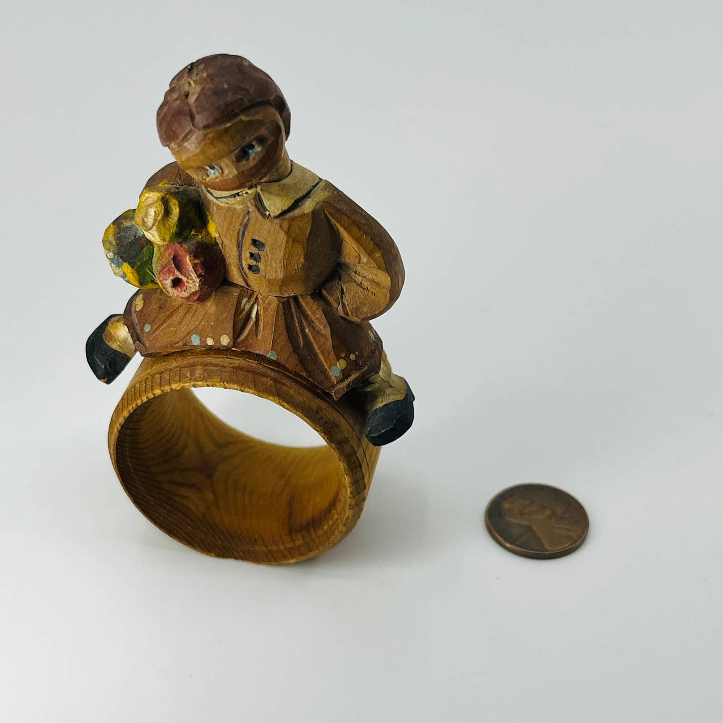 Vintage ANRI Carved Wooden Bobblehead Napkin Ring Girl w/ Bouquet SB4