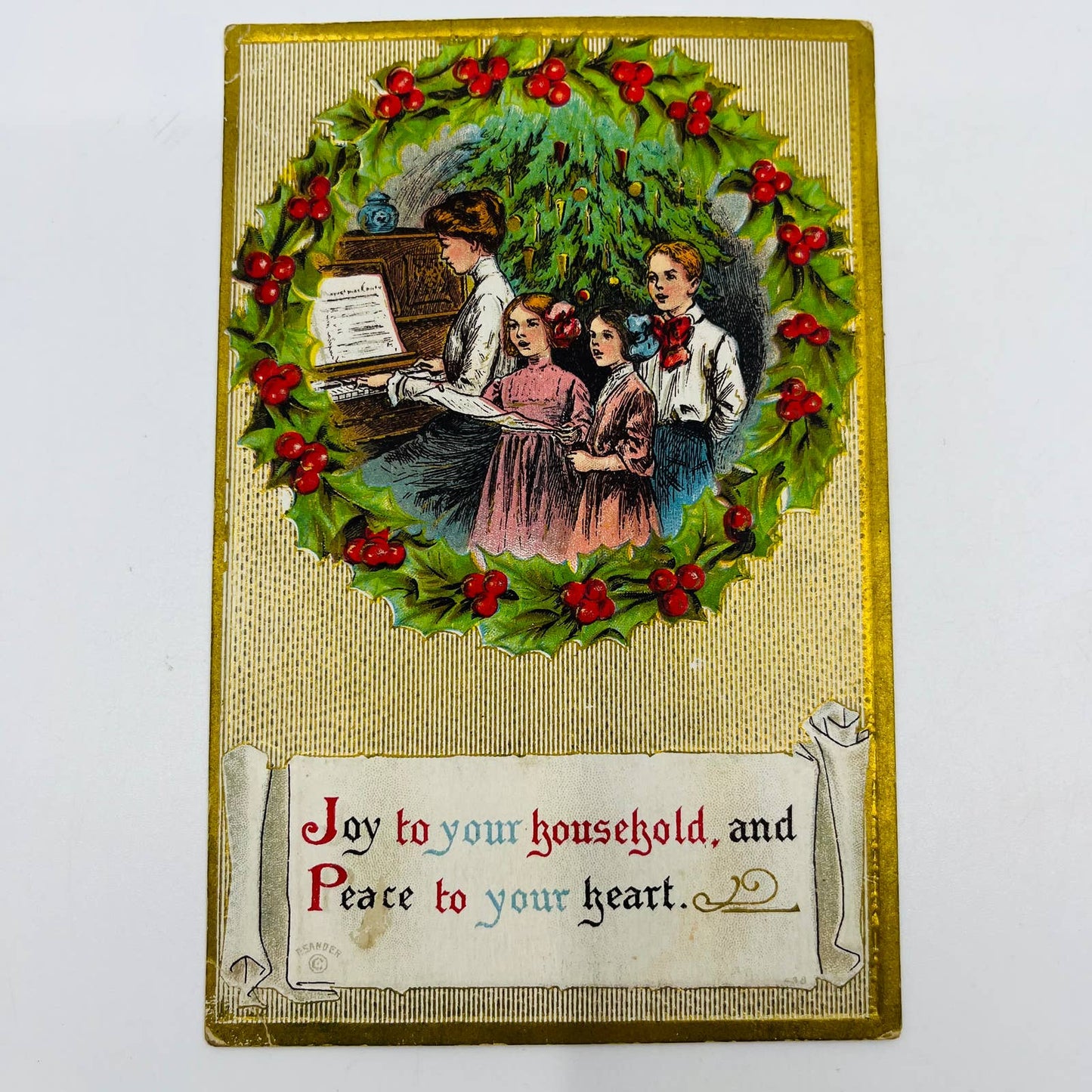 1910s Christmas Post Card Embossed Children Caroling Tree Piano Scroll Gilt PA4