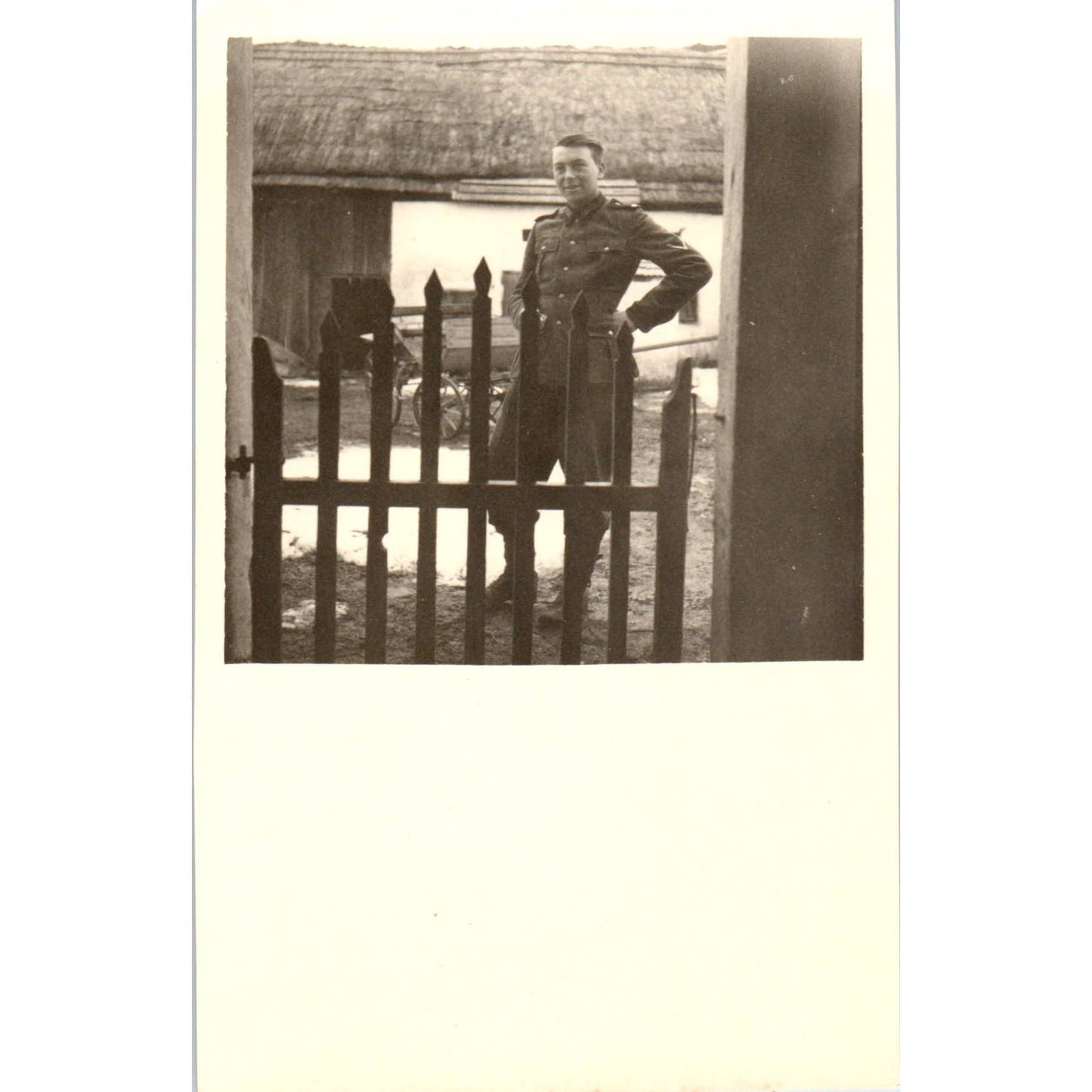 Antique Postcard RPPC WWI German Soldier Posing Next to Fence SE8