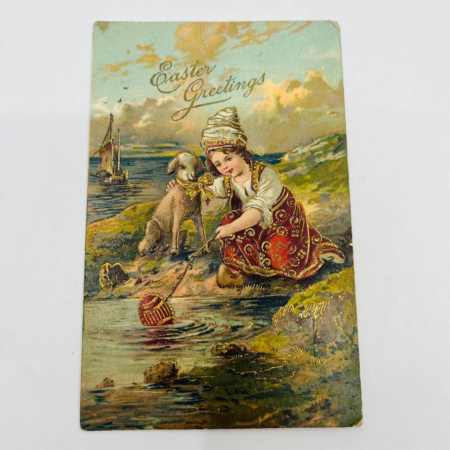 1910s Easter Post Card Embossed Cloisonné Style Girl Fishing Lamb Sailboat PA5