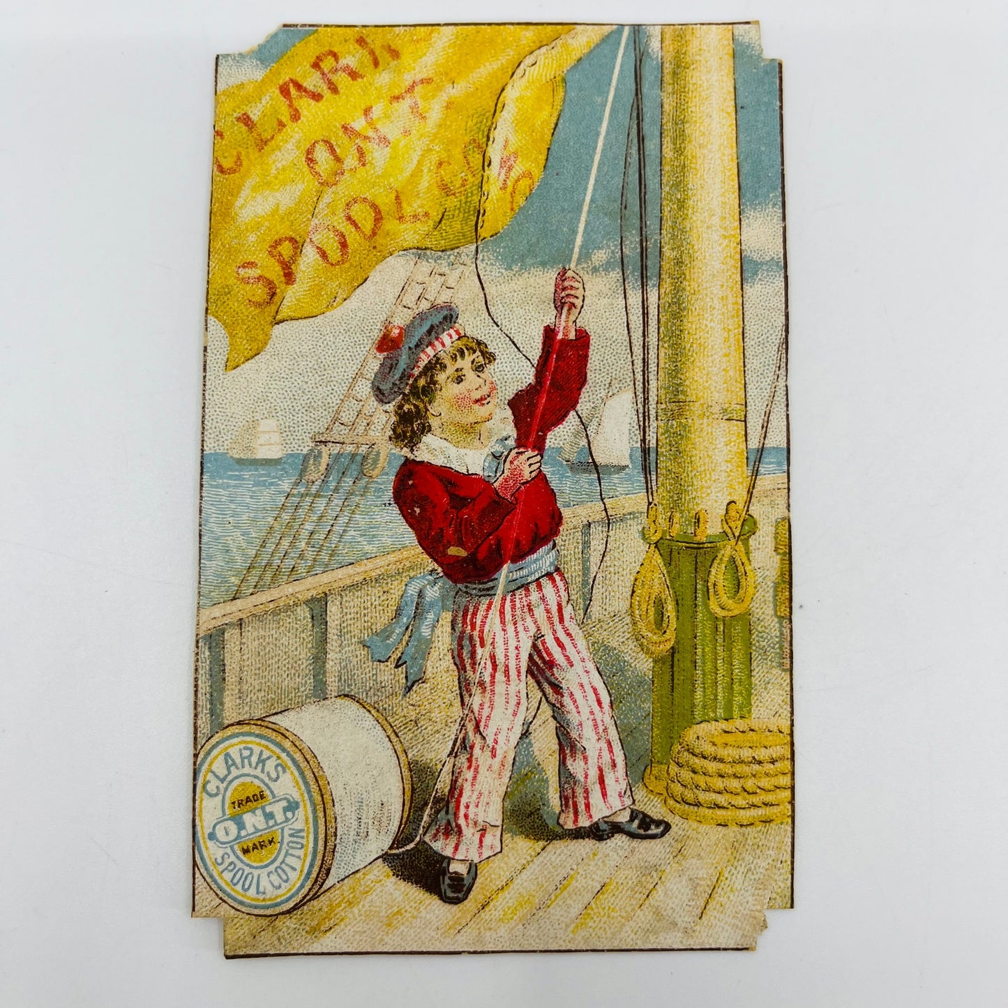 1880s Victorian Trade Card Clark’s ONT Spool Cotton Boy on Boat AH9-M6