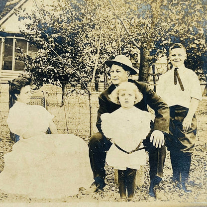 Early 1900s RPPC Portrait Family Poses Outside Farmhouse PA9