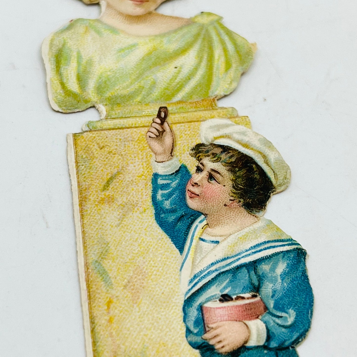 1880s Embossed Victorian Die Cut Scrap Blue Boy and Statue Woman 4.5x1.5” AH9-M9