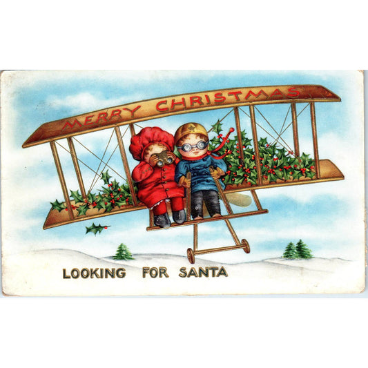 Vintage Postcard Christmas Children Looking for Santa in Plane SF2