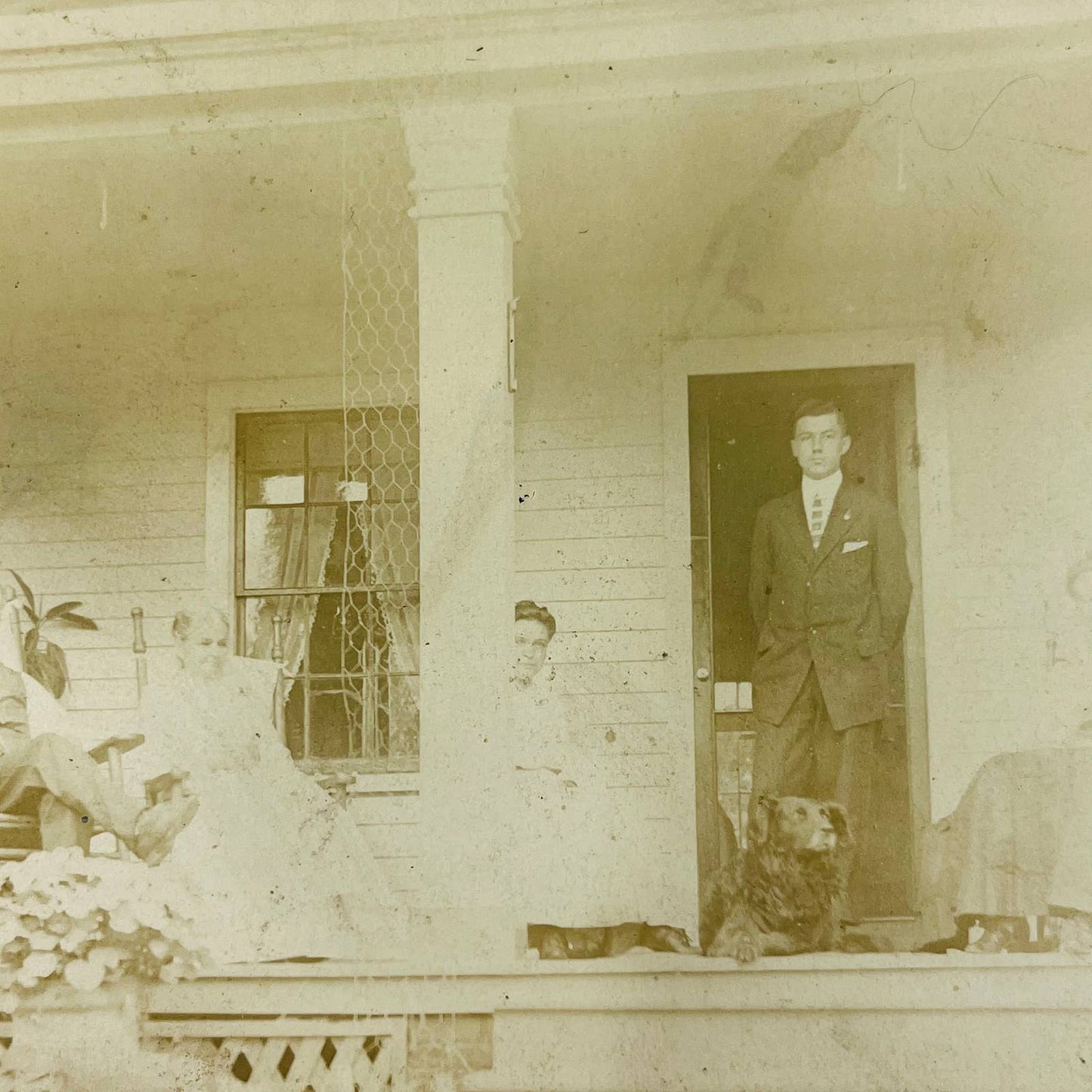 Early 1900s RPPC Portrait Family on Porch Rocking Chairs Dog PA9