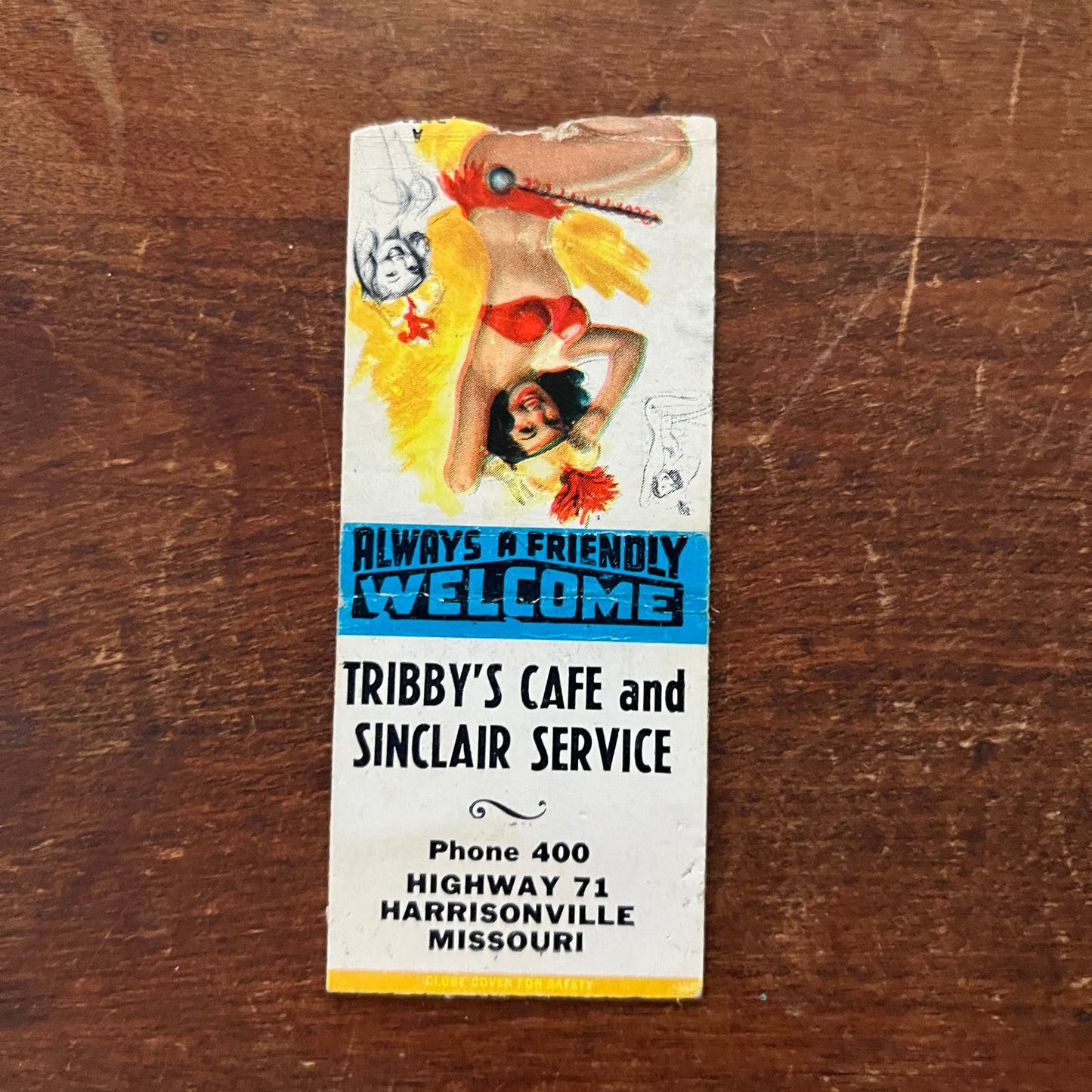 Tribby's Cafe & Sinclair Harrisonville MO PINUP Advertising Matchbook SA9-M12