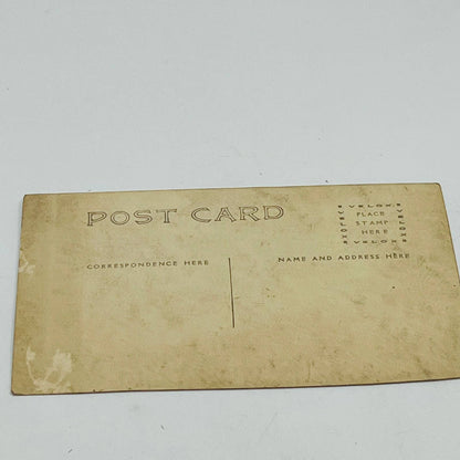 Early 1900s RPPC Young Man Posing With Hat and Bow Tie PA9