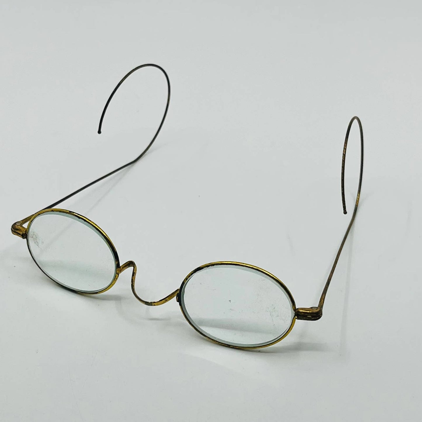 Antique 1800s Eyeglasses Gold Tone Oval Frame Cable Arms