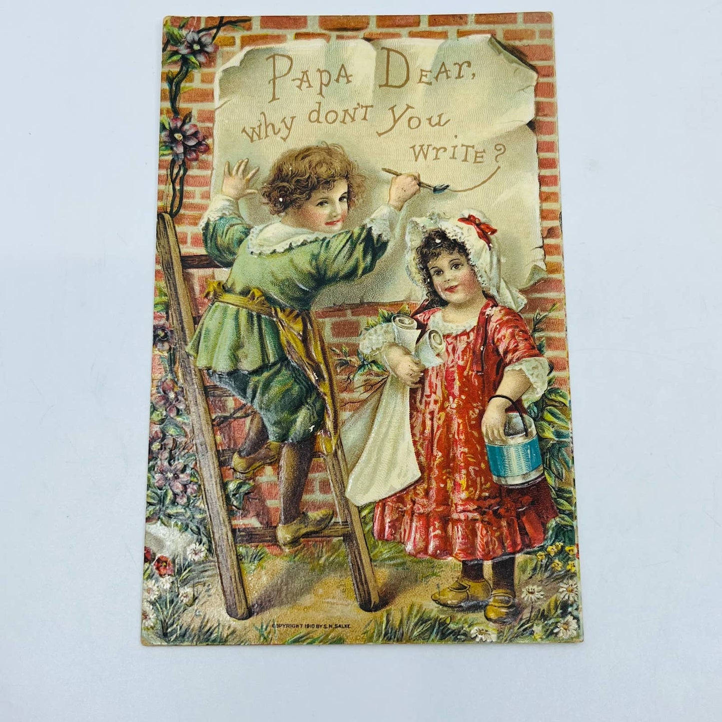 1910s Post Card Embossed Victorian Boy and Girl Painting Sign For Papa PA7