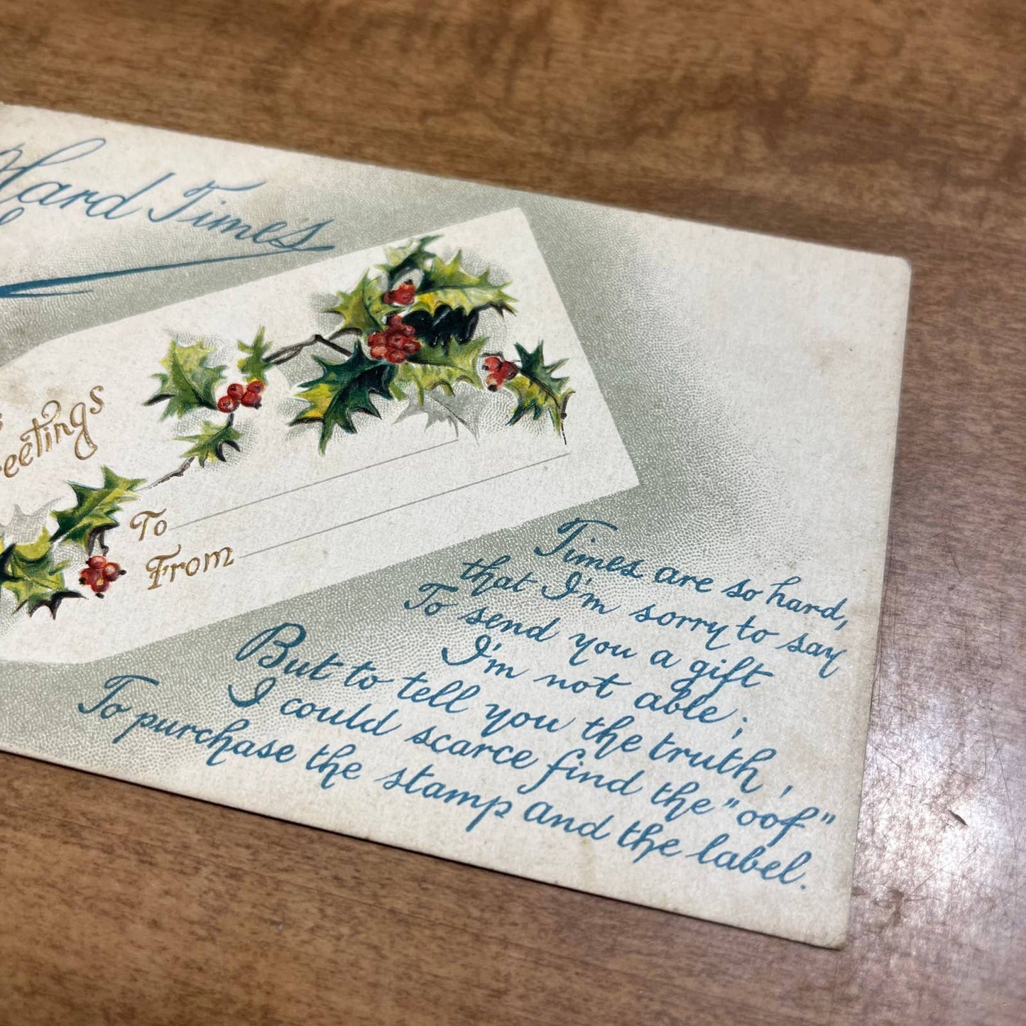 c1910 Embossed Holly Hard Times BB London X101 Christmas Greetings Postcard PA2