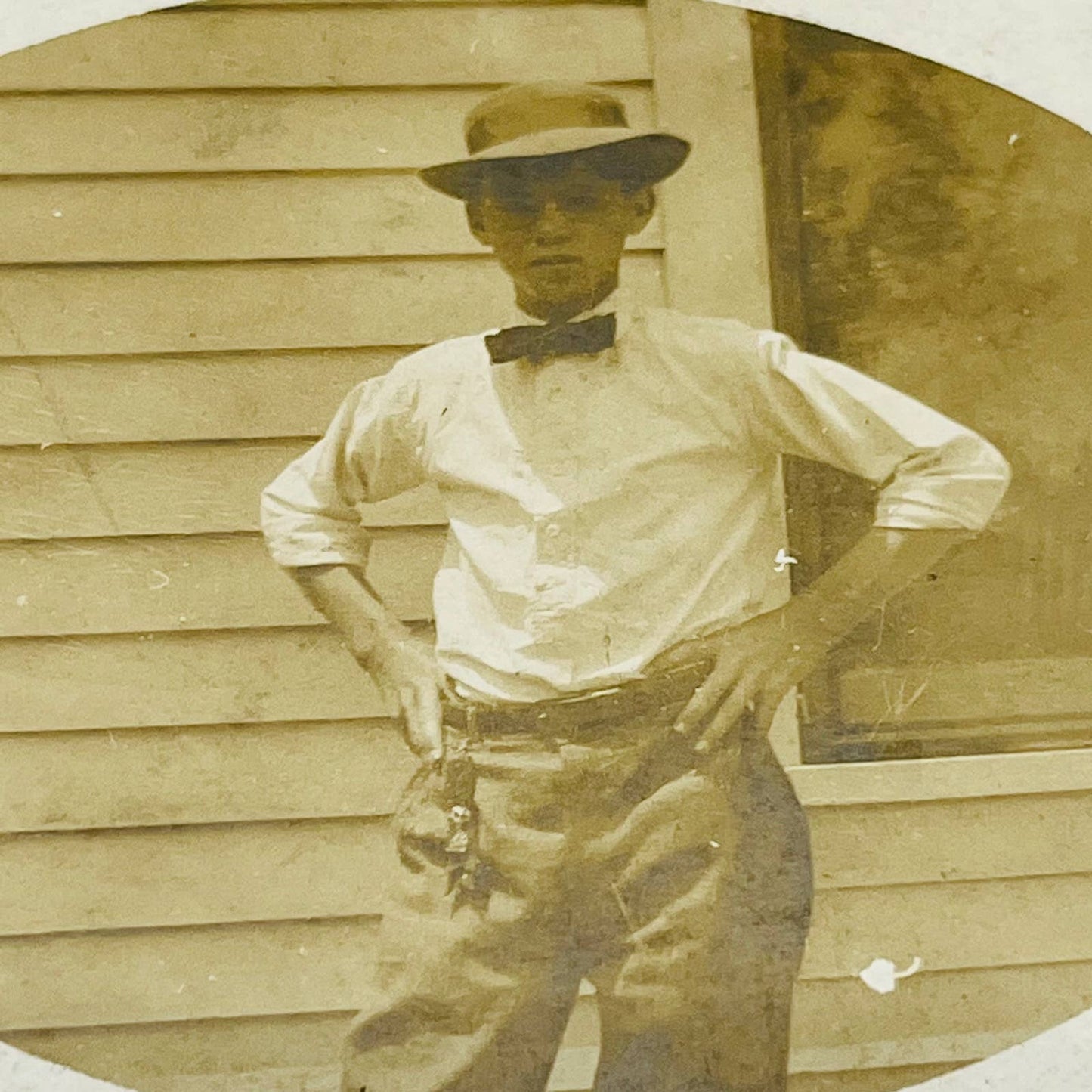 Early 1900s RPPC Young Man Posing With Hat and Bow Tie PA9