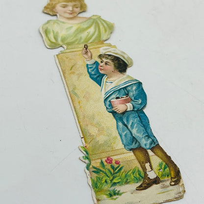 1880s Embossed Victorian Die Cut Scrap Blue Boy and Statue Woman 4.5x1.5” AH9-M9