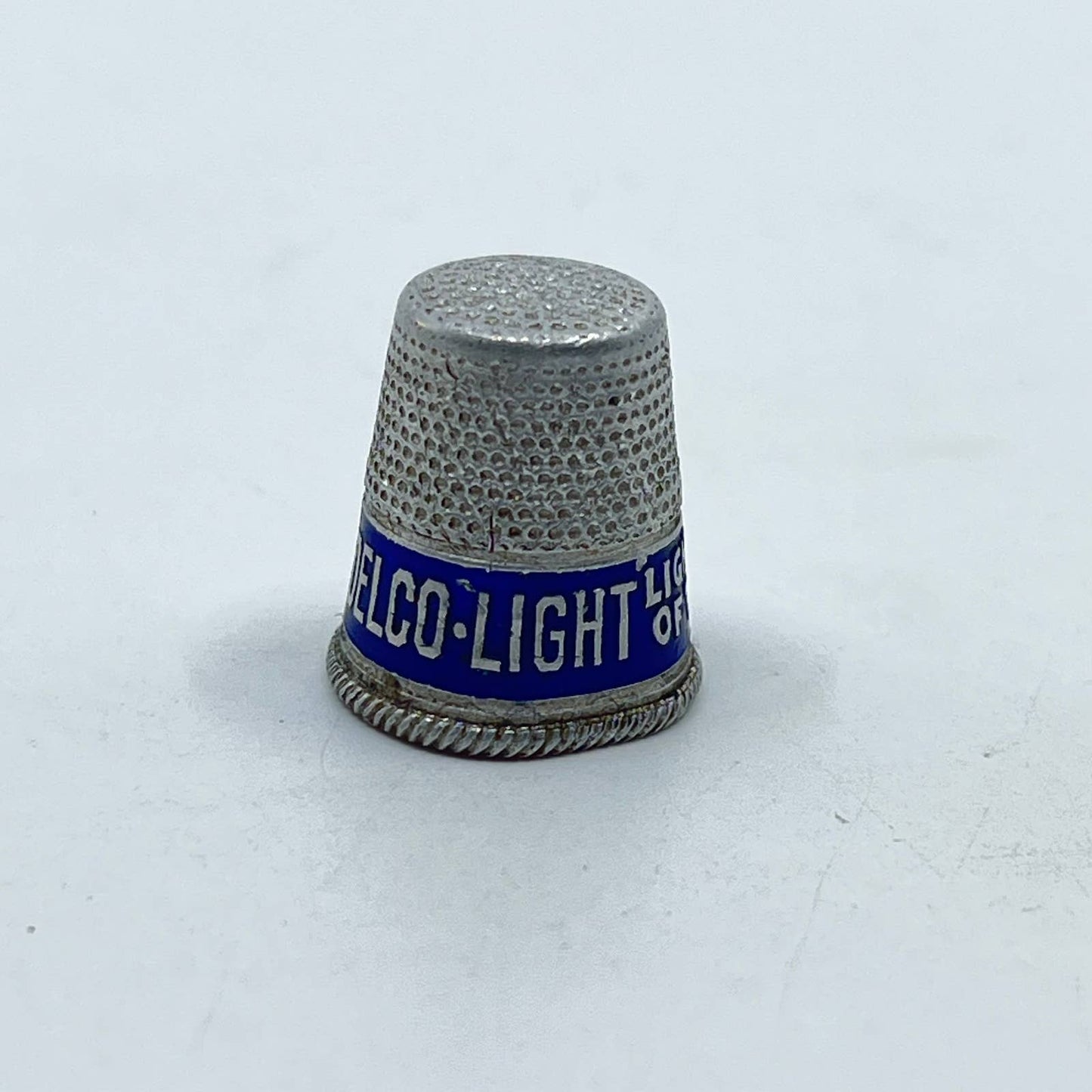 Vtg Metal Delco-Light Thimble Lightens the Burden of the Modern Housewife SD