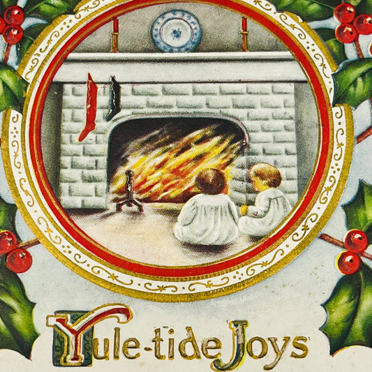 1910s Christmas Post Card Embossed Children Fireplace Stockings Candles Gilt PA4