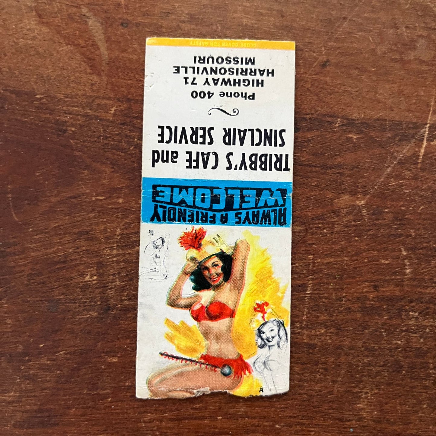 Tribby's Cafe & Sinclair Harrisonville MO PINUP Advertising Matchbook SA9-M12