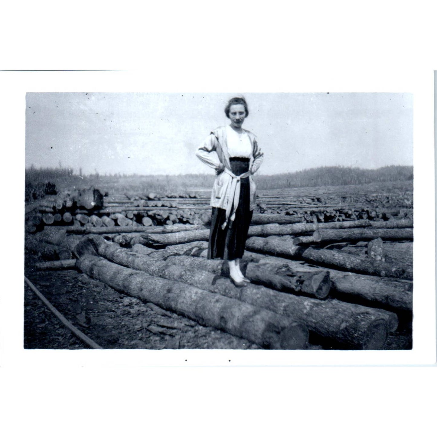 1940s Photo of Woman Standing on Logs in Lumberjack Logging Camp 3x5 SE5