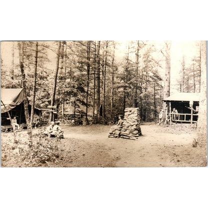 Antique Postcard RPPC Men in Forest Camp Log Cabins c1910 SE8