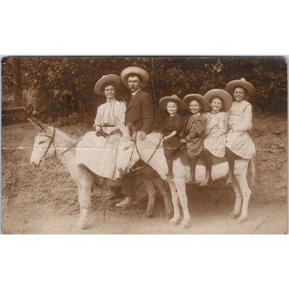 Antique Postcard RPPC Family of 6 in Sombreros Riding 2 Burros SE8