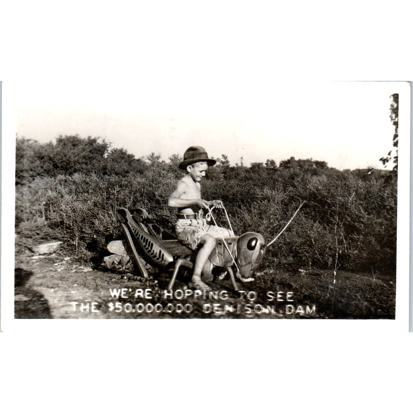 Antique Postcard RPPC Boy on Giant Grasshopper Denison Dam Texas SE8