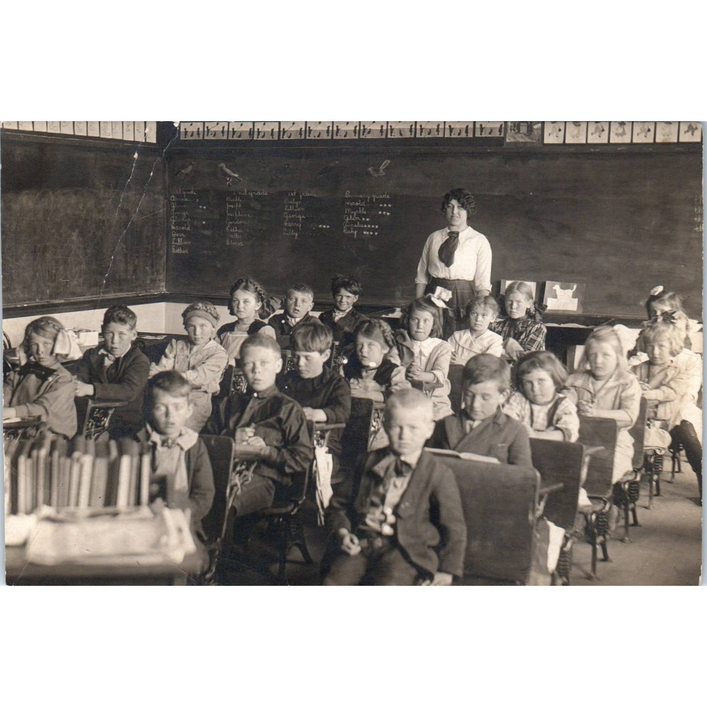 Antique Postcard RPPC Teacher in Schoolhouse Full of Children c1910 SE8