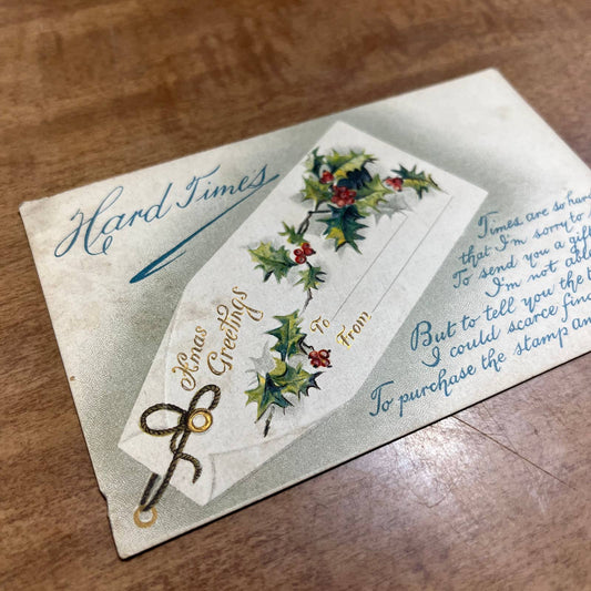 c1910 Embossed Holly Hard Times BB London X101 Christmas Greetings Postcard PA2