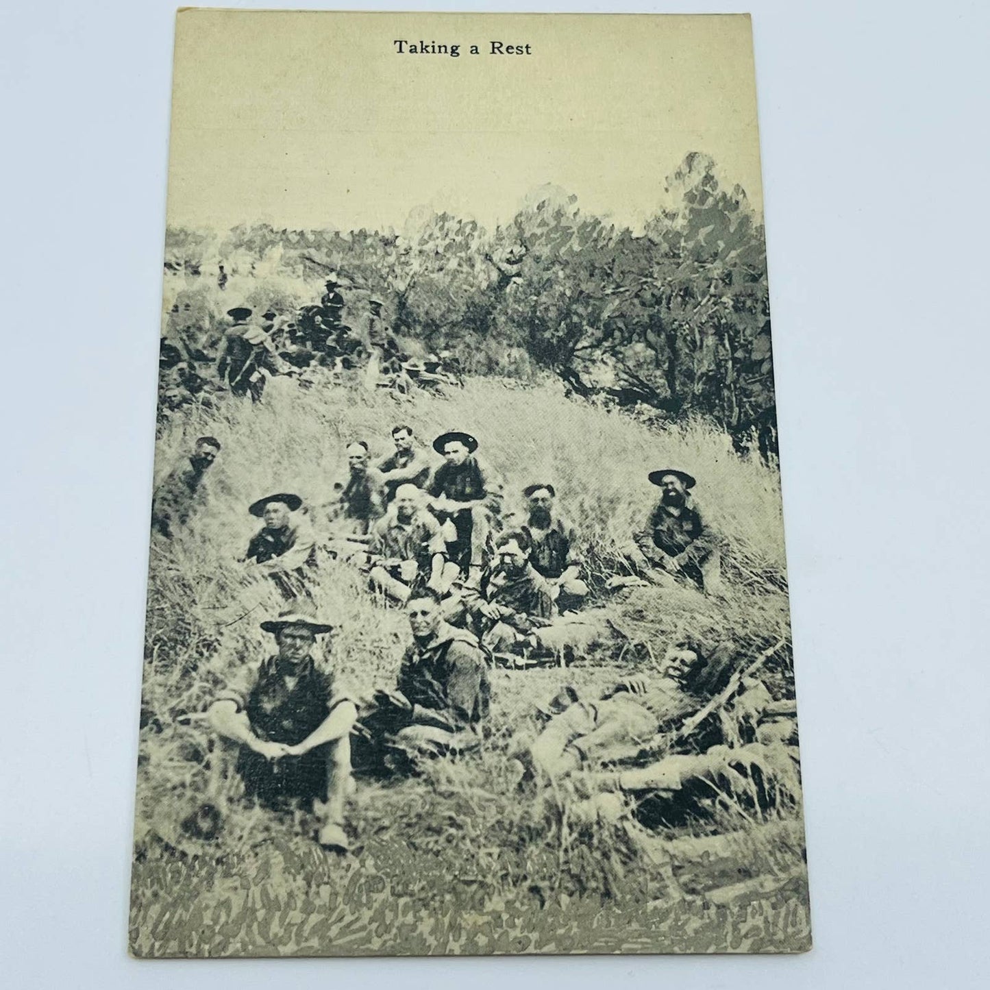 c1918 Postcard WWI RPPC Army Soldiers Resting in a Field PA9