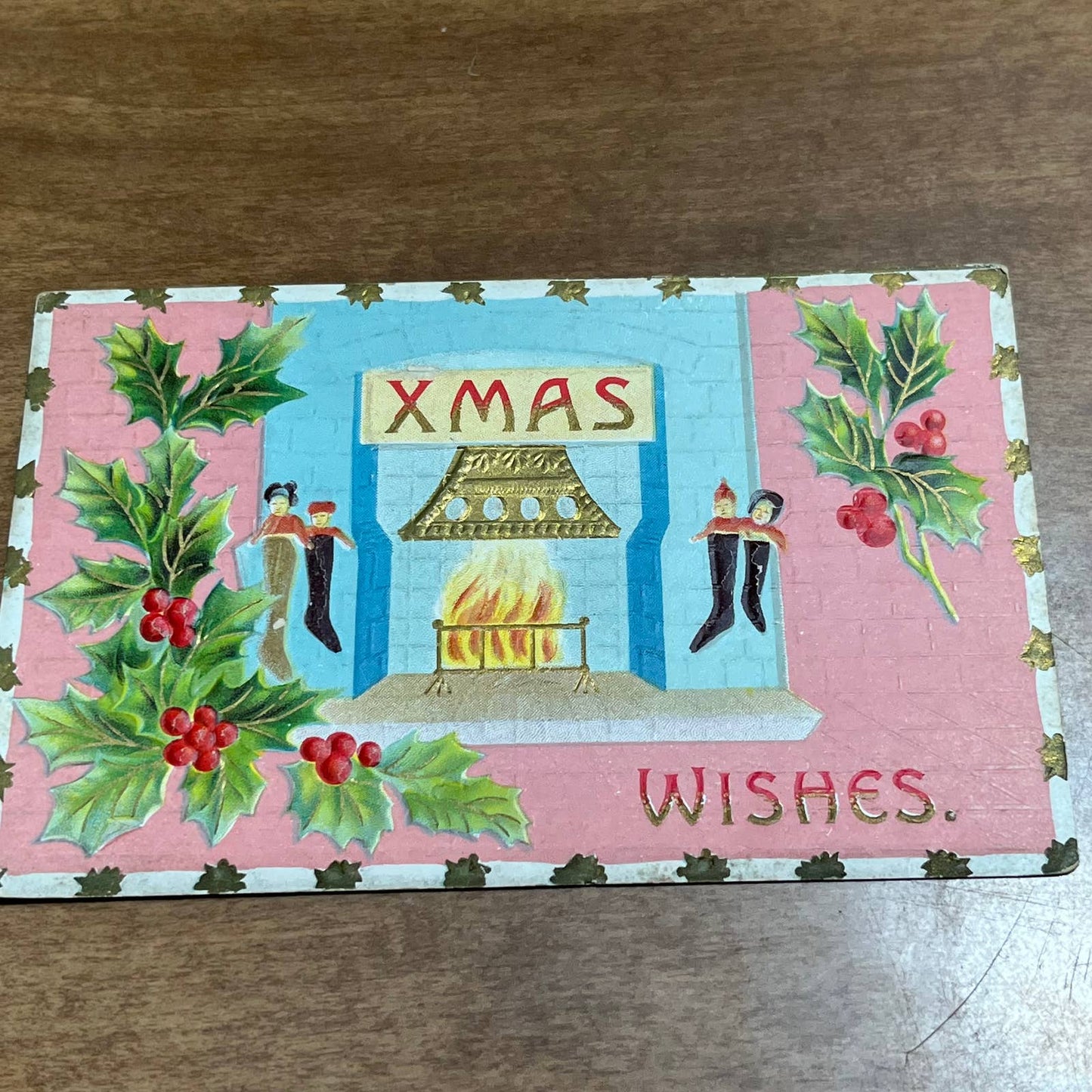 c1910 Embossed Xmas Wishes Fireplace Stockings Holly Christmas Postcard PA2