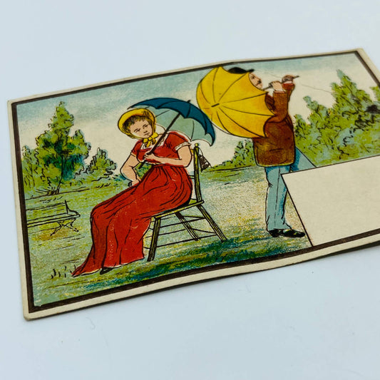 1880's VICTORIAN TRADE CARD LITHO Man & Woman W/ Umbrellas Sample Blank AA2