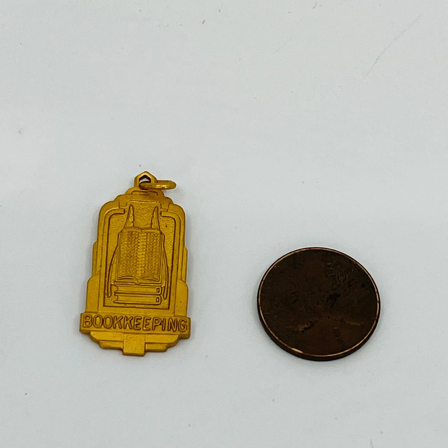 Vintage BOOKKEEPING Gold Tone Pendant Charm SB9