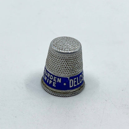 Vtg Metal Delco-Light Thimble Lightens the Burden of the Modern Housewife SD