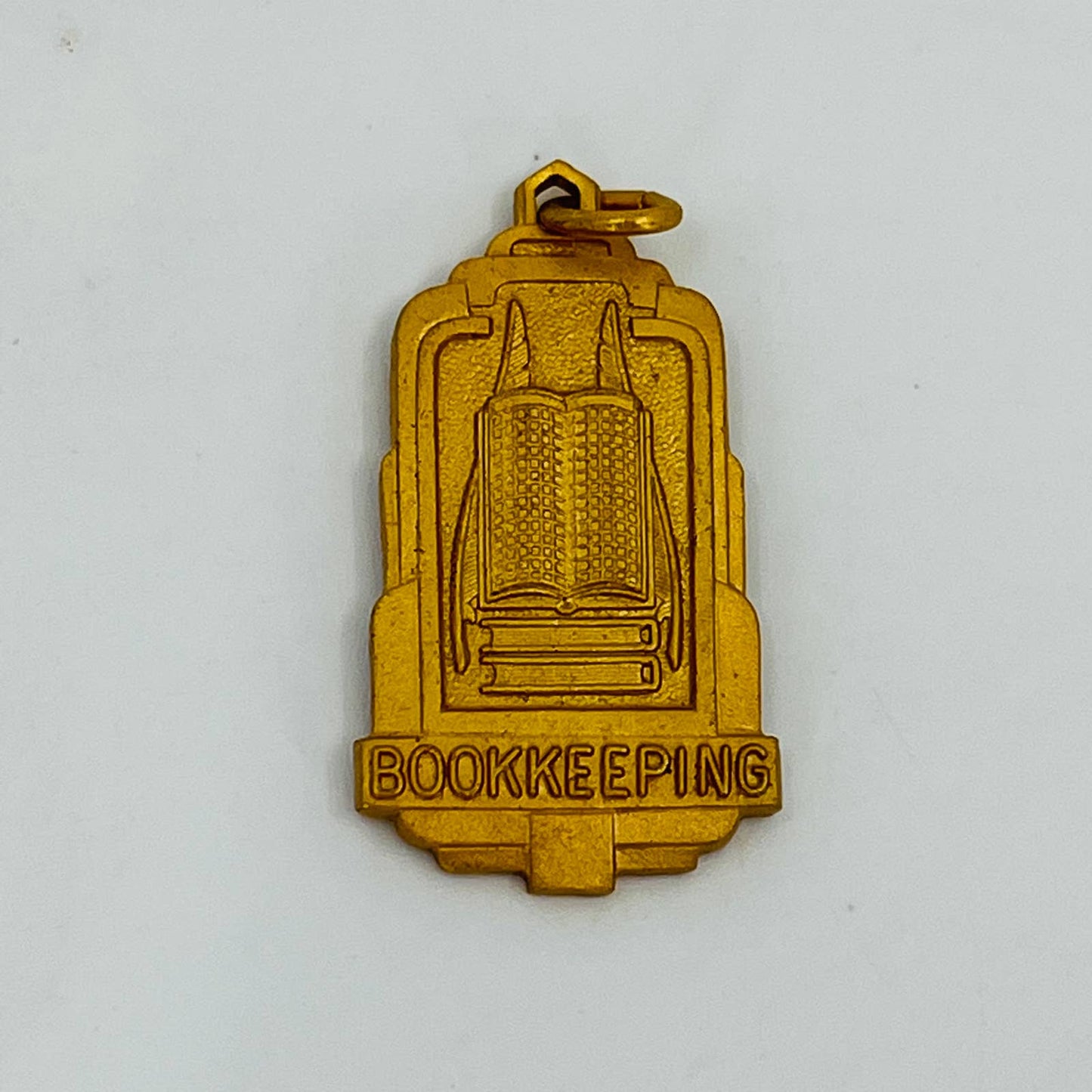 Vintage BOOKKEEPING Gold Tone Pendant Charm SB9