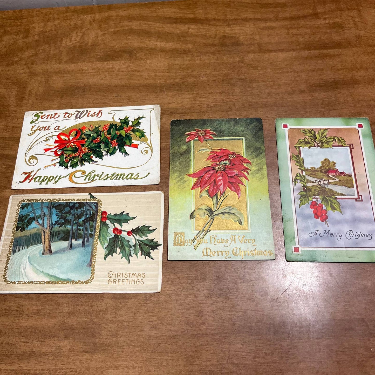SET OF 4 - c1910 Christmas Postcards Poinsettia Holly Country Scene Farm PA2