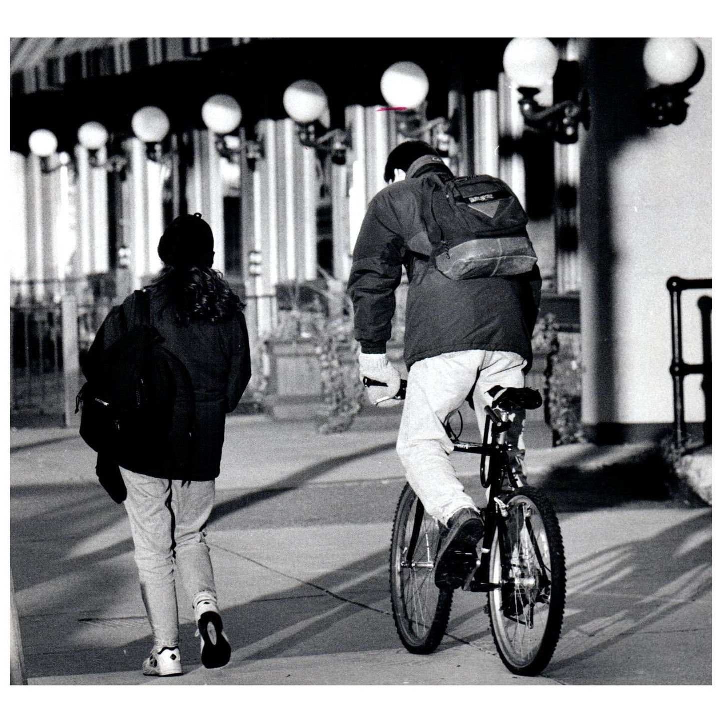 1997 Press Photo Man on Bike and Woman Boston Northeastern University 8x8" AD3